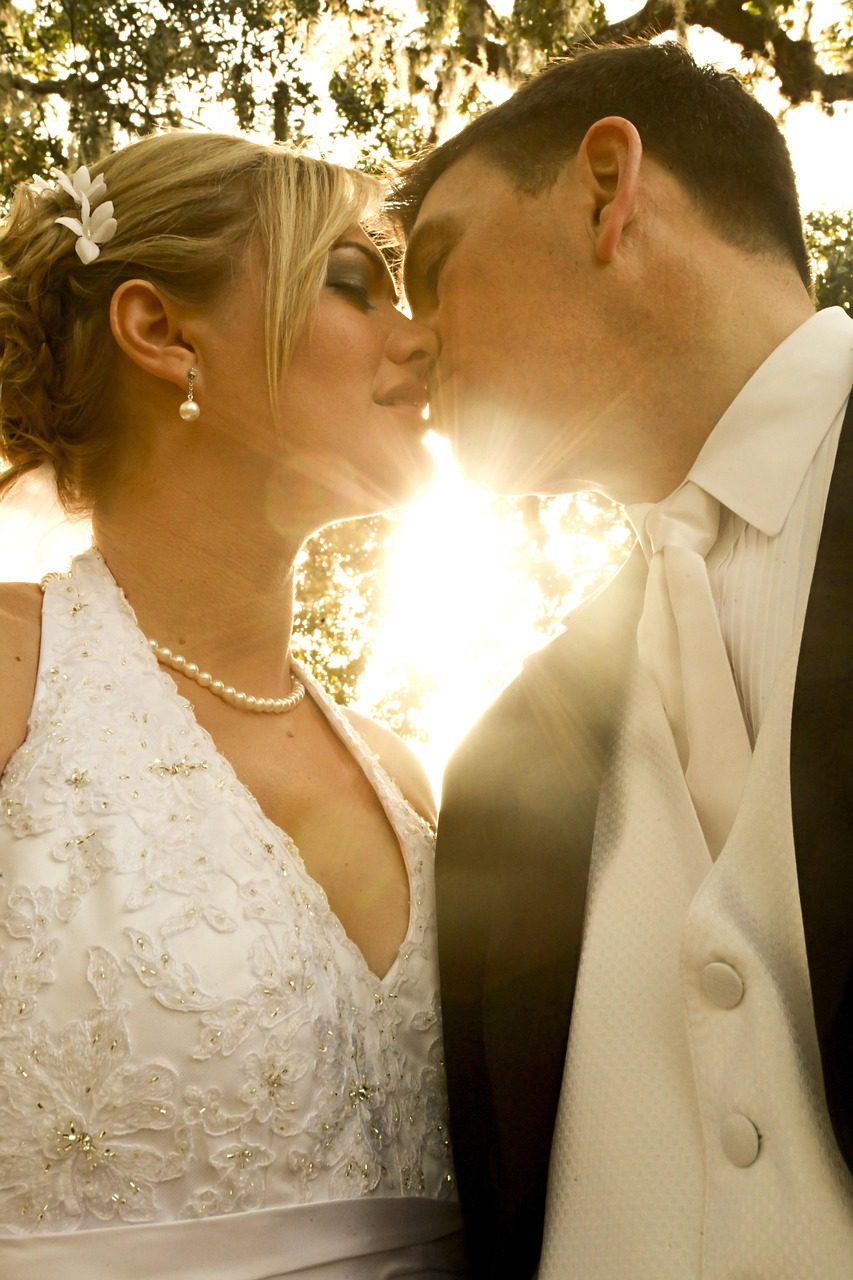 Bride and groom kissing during an Intimate wedding planned by Hopes & Dreams in Middle Georgia